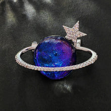 Load image into Gallery viewer, Gorgeous Blue and Purple Planet Saturn Pin with Silver Star Accent
