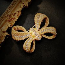 Load image into Gallery viewer, Stunning Gold Croissant Ribbon Bow Brooch Pin with Crystal Accent
