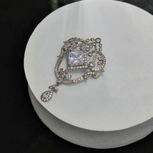 Load image into Gallery viewer, Magnificent Silver tone Opens Garland Style Square Stone Accent Brooch with Pearl Drop
