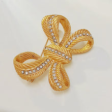 Load image into Gallery viewer, Stunning Gold Croissant Ribbon Bow Brooch Pin with Crystal Accent
