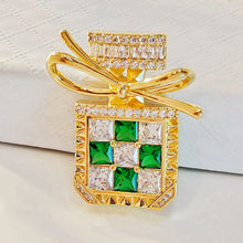 Load image into Gallery viewer, Splendid Gold Tone Green Stone-Studded Perfume Bottle Brooch with Bowtie Lady Pin Jewelry
