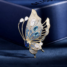 Load image into Gallery viewer, Jewelblings Gorgeous Gold Tone Blue Profile Butterfly Pin with Marquise Cut Stone Accent
